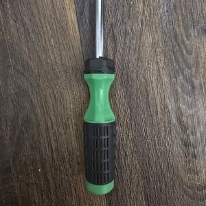 Green and Black Handled Screwdriver